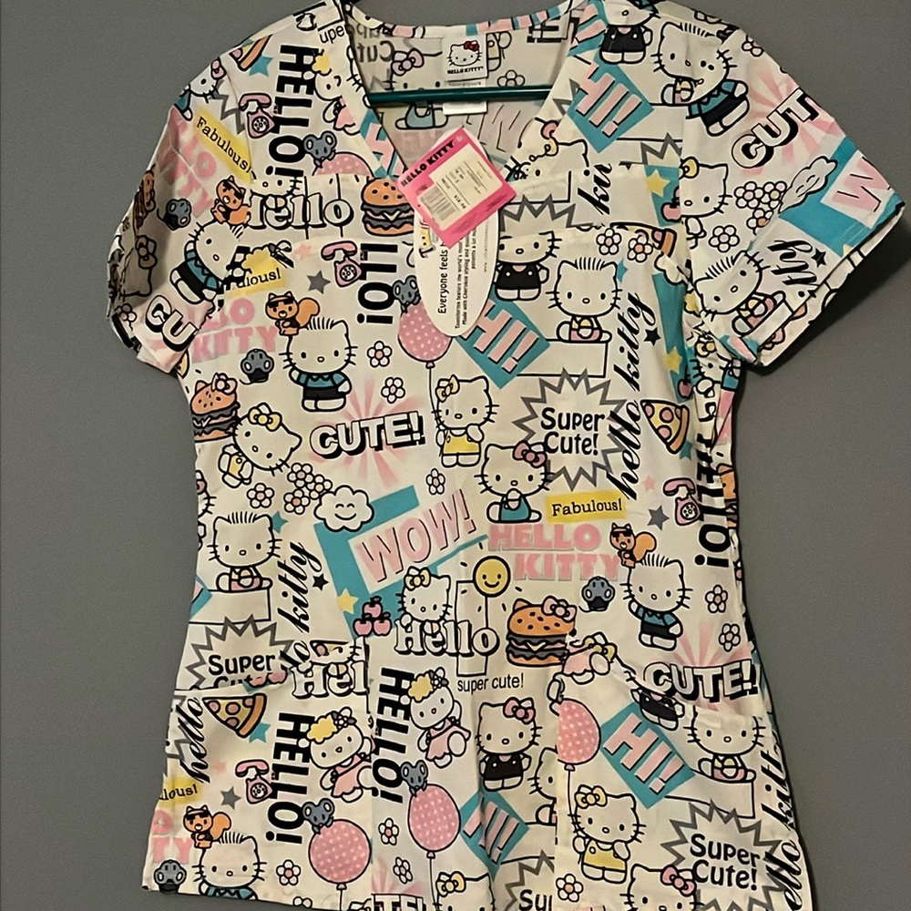 Brand new hello kitty scrub top!! Size S never been worn still has tags on it.
